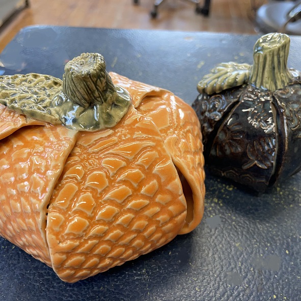 Two ceramic pumpkins